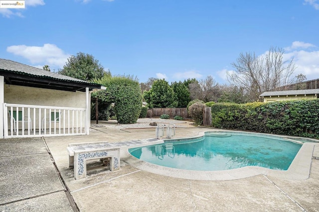 view of swimming pool featuring a patio