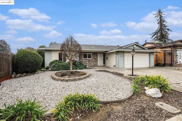 ranch-style home with a garage