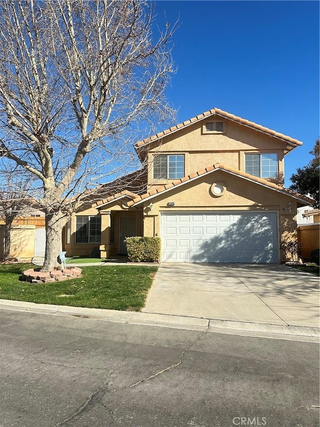 front of property with a garage