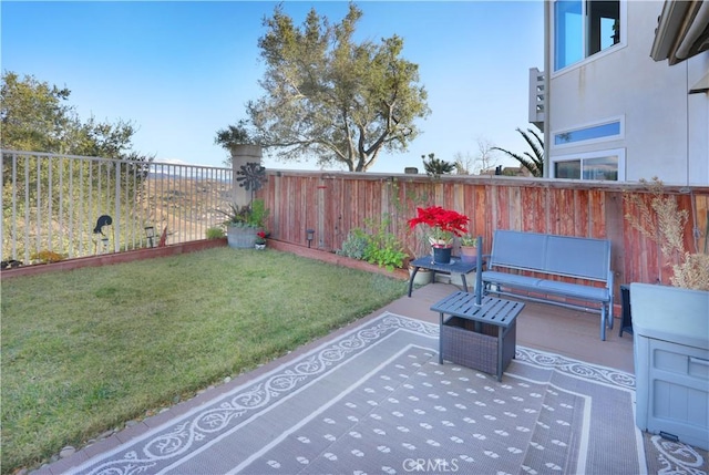 view of patio / terrace featuring a fenced backyard and outdoor lounge area