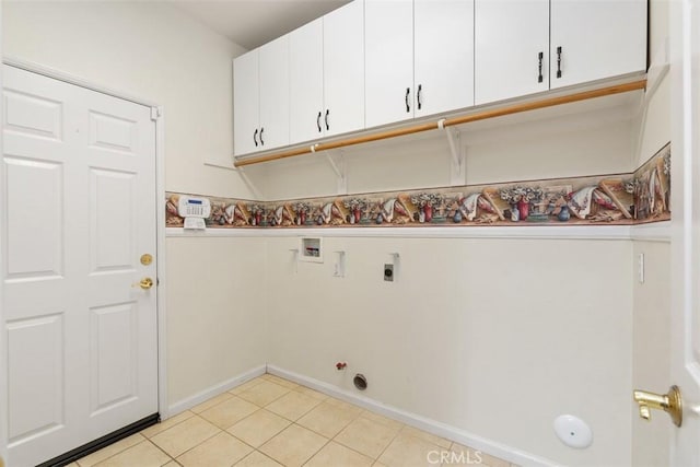 laundry area with cabinet space, light tile patterned floors, gas dryer hookup, hookup for an electric dryer, and washer hookup