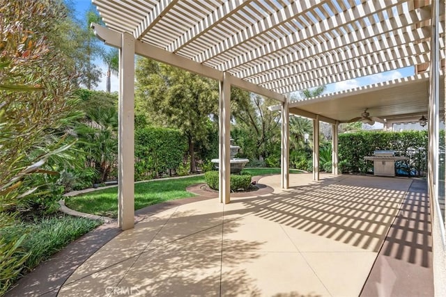 view of patio / terrace featuring a ceiling fan and a pergola