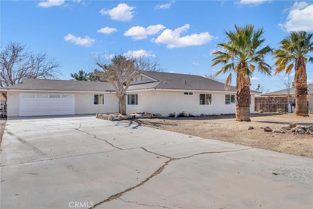 ranch-style home with a garage