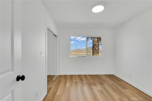 empty room featuring light wood-type flooring