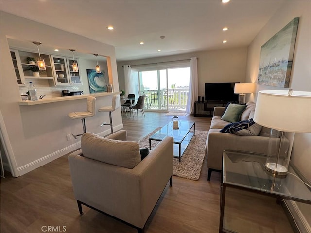 living room with dark wood-type flooring