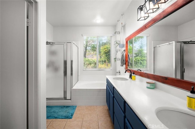 bathroom with vanity, separate shower and tub, and tile patterned flooring