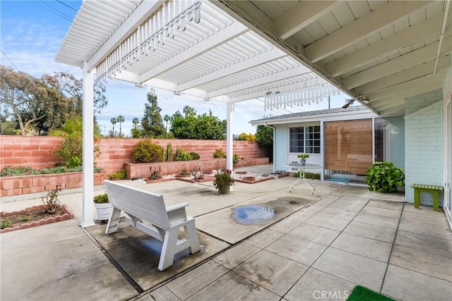 view of patio / terrace featuring a pergola