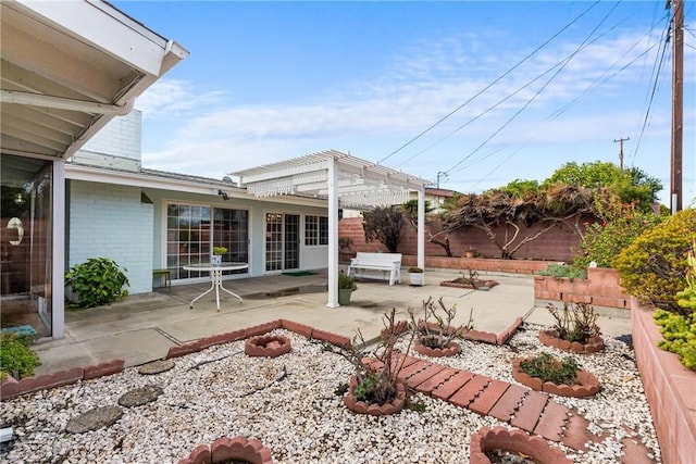 view of patio featuring a pergola