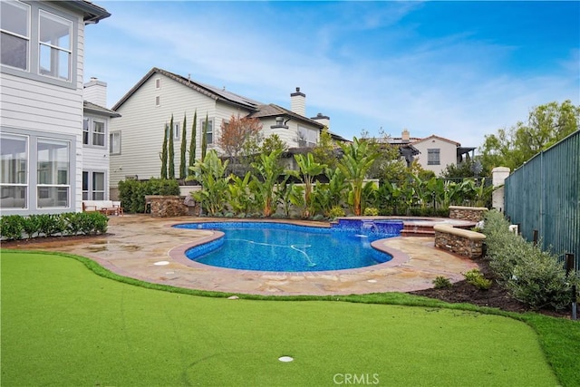 view of swimming pool featuring a patio, a hot tub, and pool water feature