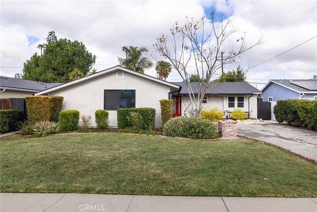 ranch-style house with a front yard