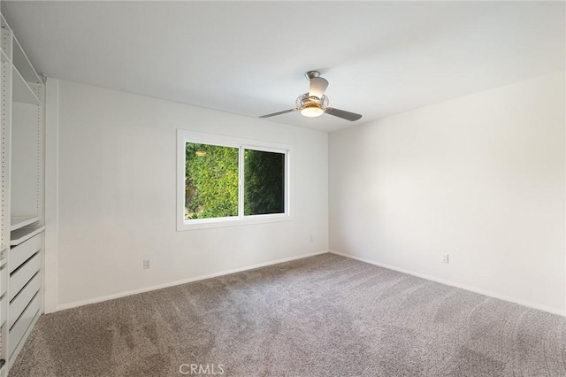 unfurnished bedroom featuring carpet and ceiling fan