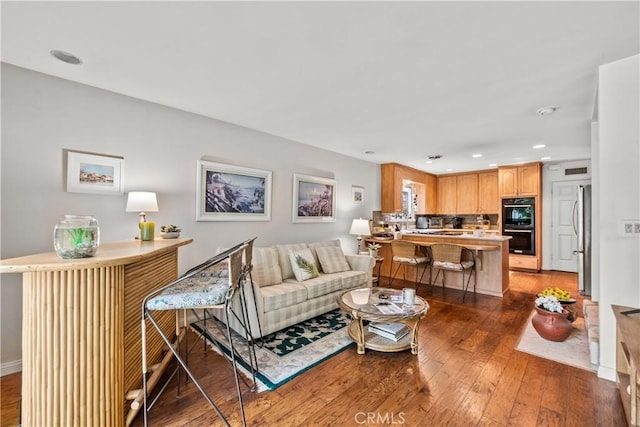 living room with dark wood-type flooring