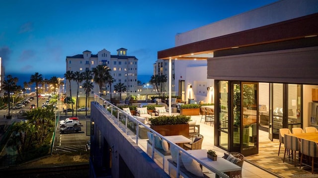 view of balcony at dusk