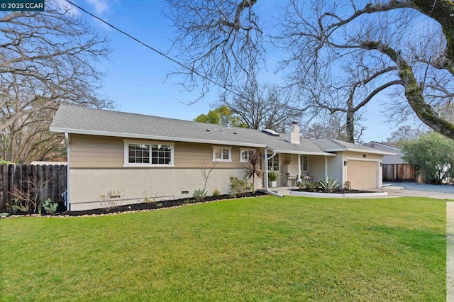 single story home featuring a garage and a front lawn