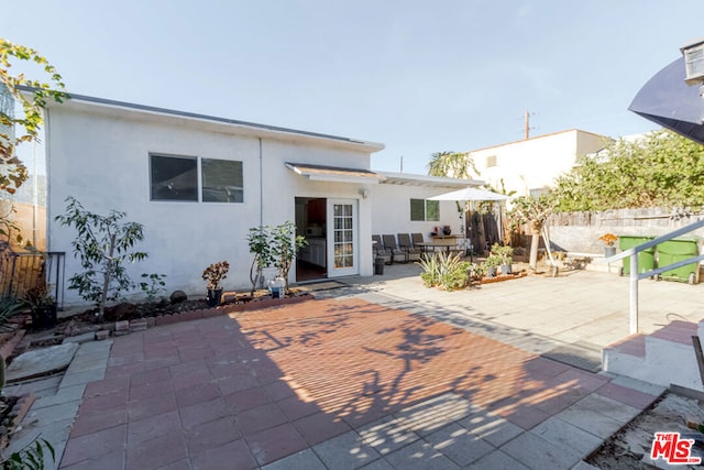 rear view of house with a patio area