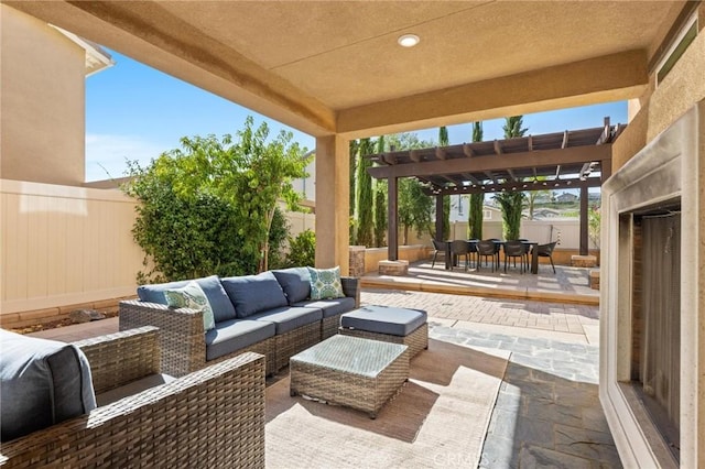 view of patio / terrace with a pergola and outdoor lounge area