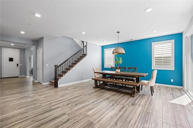 dining room featuring light hardwood / wood-style flooring