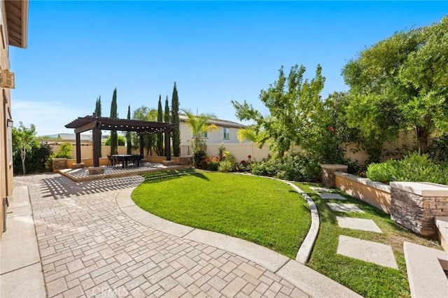 view of yard featuring a patio area and a pergola