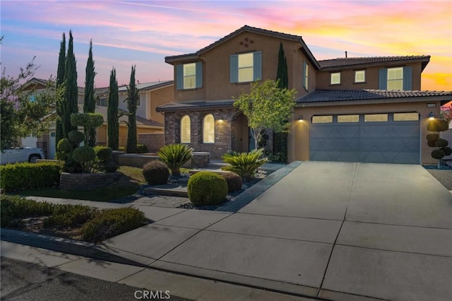 view of front of home with a garage