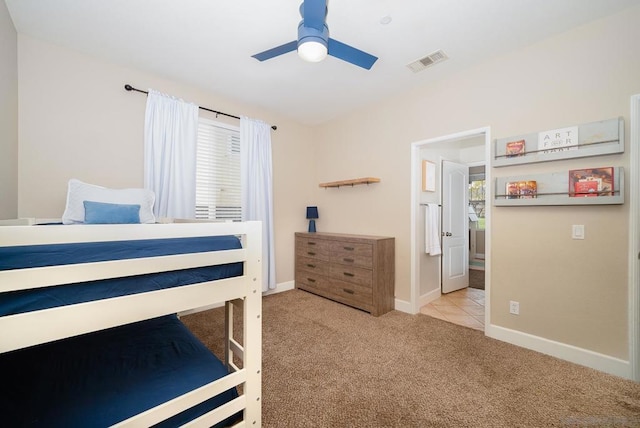 unfurnished bedroom with light carpet and ceiling fan