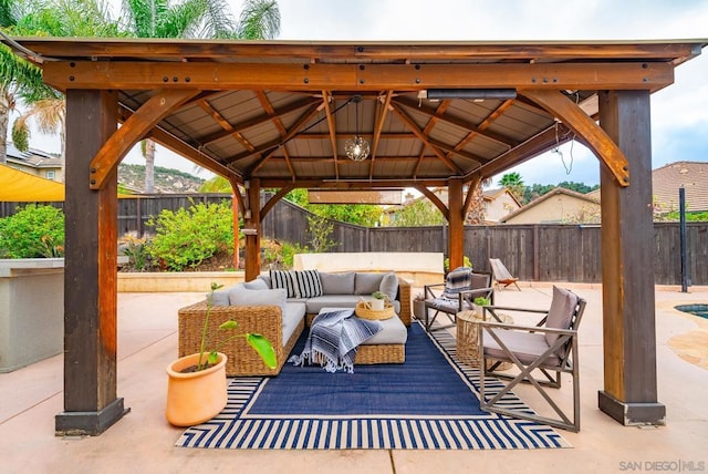 view of patio with a gazebo and outdoor lounge area