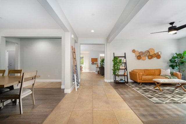 tiled entrance foyer with ceiling fan