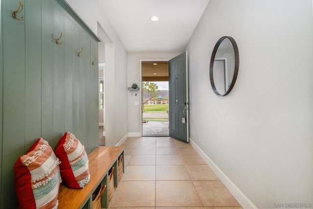 mudroom with light tile patterned floors