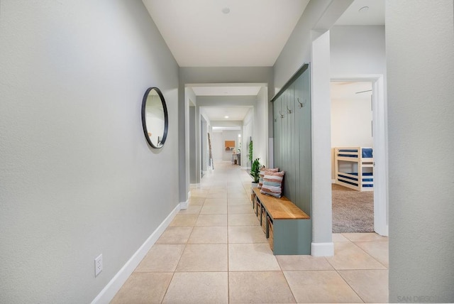 hallway with light tile patterned flooring