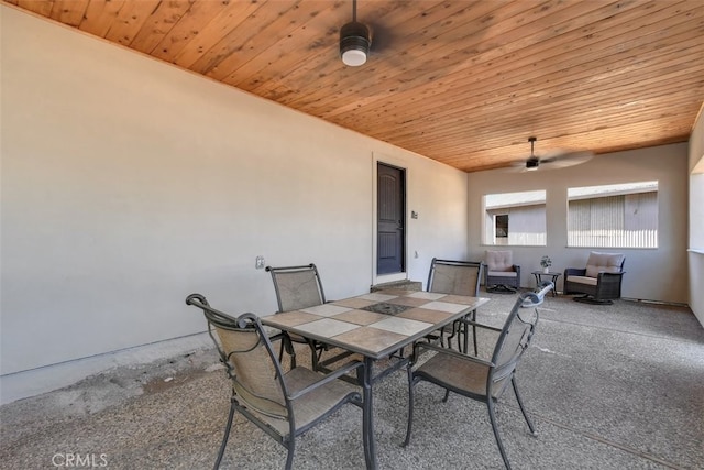 view of patio featuring ceiling fan