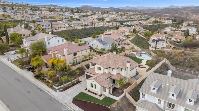 bird's eye view with a mountain view