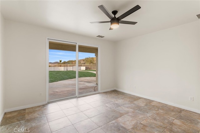 unfurnished room featuring ceiling fan