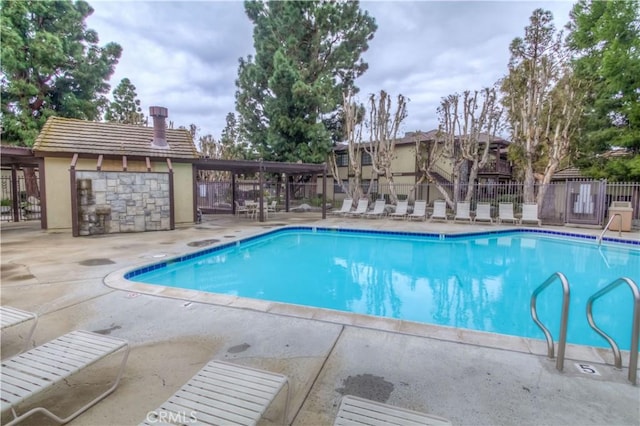 view of pool featuring a patio area