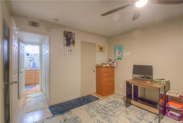 interior space featuring ceiling fan