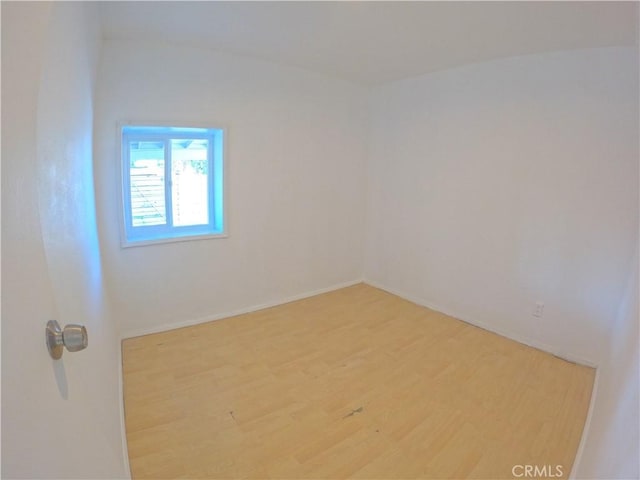 empty room featuring light hardwood / wood-style floors