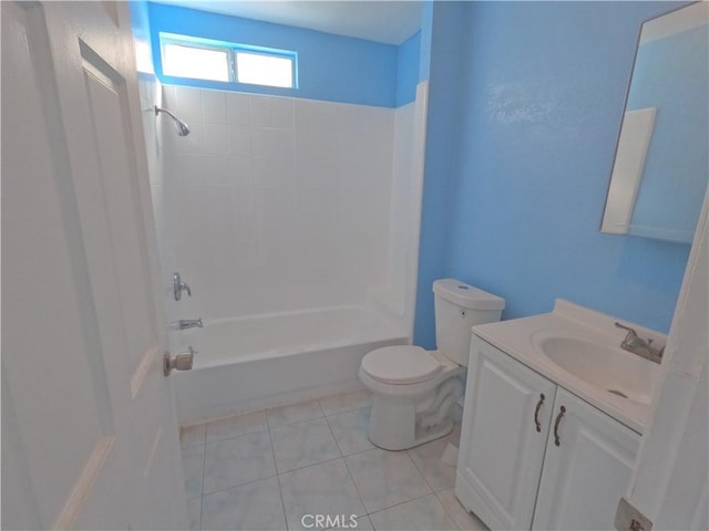 full bathroom featuring tile patterned flooring, vanity, toilet, and  shower combination