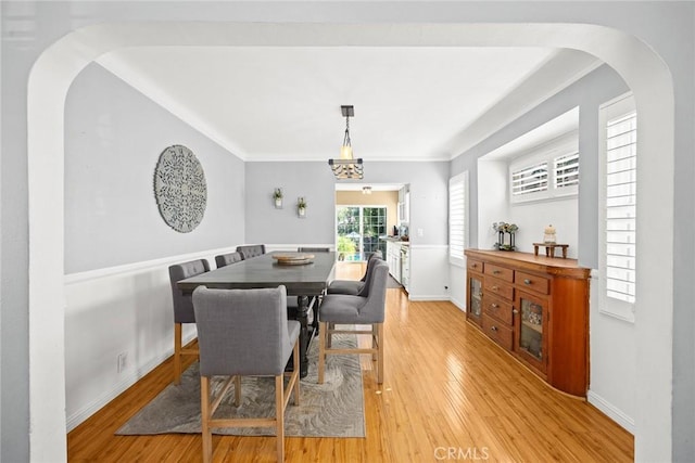 dining area with light hardwood / wood-style floors