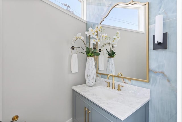 bathroom featuring vanity and plenty of natural light