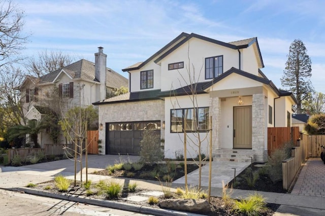 modern farmhouse style home featuring a garage