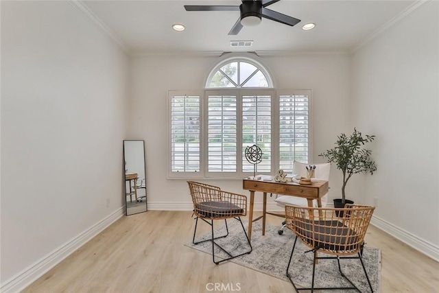 sitting room featuring crown molding, ceiling fan, and light hardwood / wood-style flooring