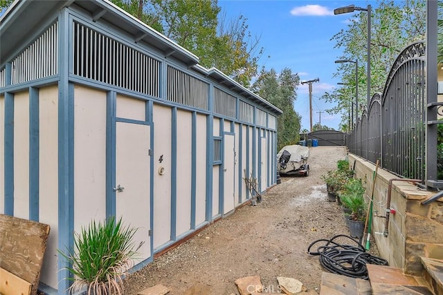 view of home's exterior featuring an outdoor structure