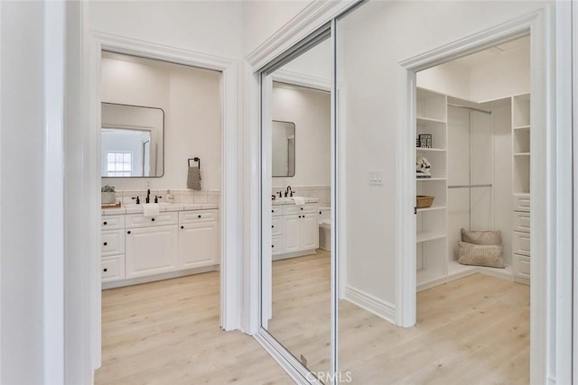 bathroom featuring vanity and hardwood / wood-style floors