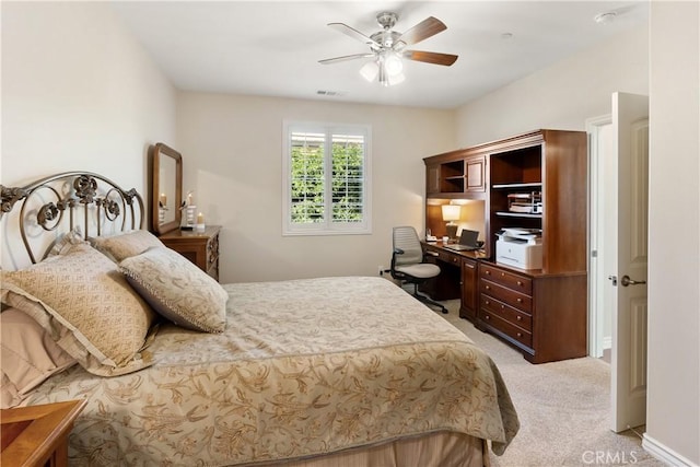 bedroom with a ceiling fan, light carpet, and visible vents