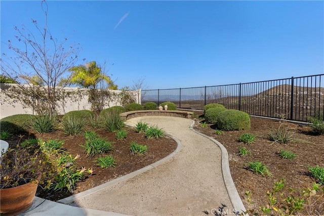 view of community featuring a fenced backyard