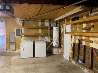 basement with separate washer and dryer and water heater