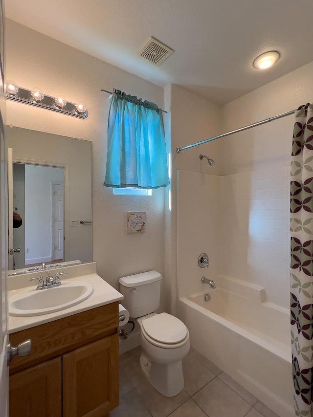 full bathroom featuring tile patterned flooring, vanity, shower / bath combination with curtain, and toilet