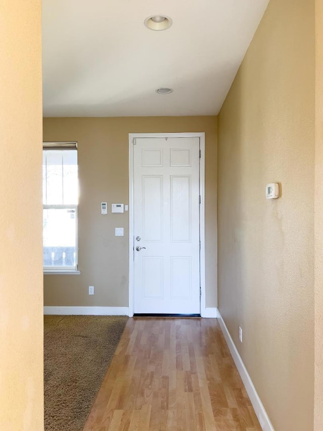 doorway to outside featuring light hardwood / wood-style floors