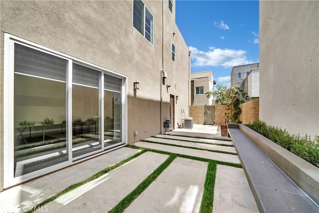 249 Chorus, Irvine, CA 92618 - exterior space with fence, a patio, stucco siding, and cooling unit