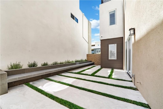 249 Chorus, Irvine, CA 92618 - view of home's exterior featuring fence and stucco siding