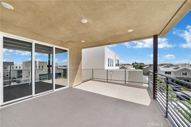 view of patio / terrace with a balcony