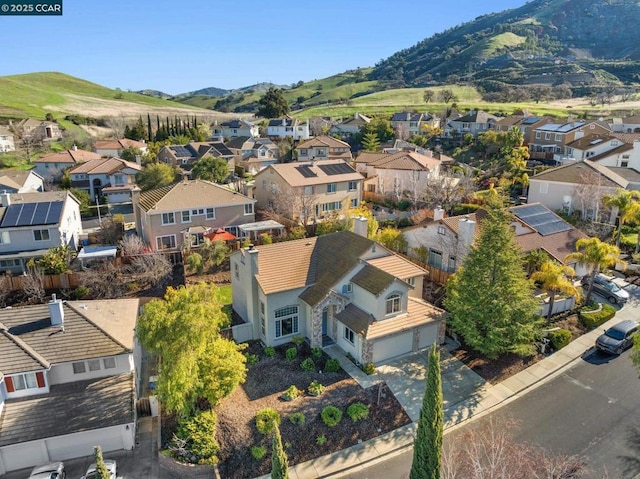 drone / aerial view featuring a mountain view